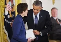 Dr. Tam O'Shaughnessy Receives Dr. Sally Ride's Presidential Medal of Freedom from President Barack Obama