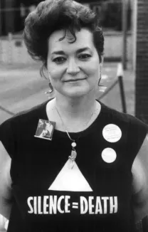 Lori Cannon Wearing a Silence=Death Tee-Shirt as a Younger Woman