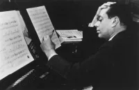 Cole Porter Working on Musical Arranging at Piano