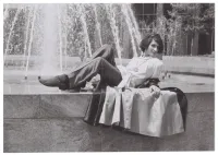Sylvia Rivera Sitting on Ledge of a Fountain