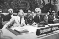 Dag Hammarskjöld at the UN Sitting in the Secretary General Seat With Other Diplomats