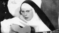 Jeanne Deckers With Guitar in Her Nuns Habit