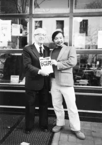 Buckminster Fuller and Kiyoshi Kuromiya Holding Their Book Critical Path Outside a Bookstore