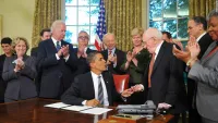 Frank Kameny with President Barack Obama at a Signing Ceremony Granting Some Benefits to Same-Sex Partners of Federal Workers