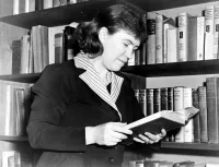 Margaret Mead Reading in a Library