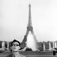 Tseng Kwong Chi at the Eiffel Tower in 1979 From East Meets West