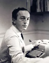 Frank O'Hara at his Typewriter Gazing at the Camera