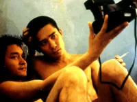 Still Image of Leslie Cheung and Co-star Tony Leung in Happy Together