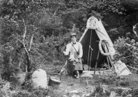Freda Du Faur in Front of her Climbing Campsite Tent