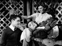 Sal Mineo, James Dean (lying down) and Natalie Wood in a Scene From Rebel Without a Cause