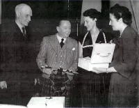 Sir Ewan and Lady Isabella Forbes on their Wedding Day in 1952 (Center) with the Minister and his Wife