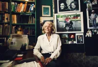 Edith Windsor Sits in Her Home Office With Pictures and Books Surrounding Her