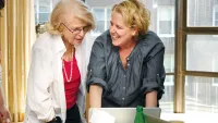 Edith Windsor and Roberta Kaplan Looking at a Laptop Screen