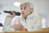 Margot Heuman Speaks at an Event in 2019