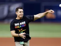 Billy Bean Throws Out Ceremonial First Pitch in 2016 Wearing a We Are Orlando Pride T-Shirt
