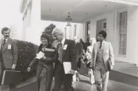Charlie Brydon, Jean O’Leary, Bruce Voeller, Frank Kameny, Myra Riddell and George Raya Exit the White House After Meeting With Midge Costanza and Other Senior Staffers on March 26, 1977