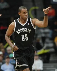 Jason Collins on the Basketball Court in His Brooklyn Nets Number 98 Jersey