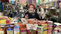 Lori Cannon and a Volunteer at GroceryLand